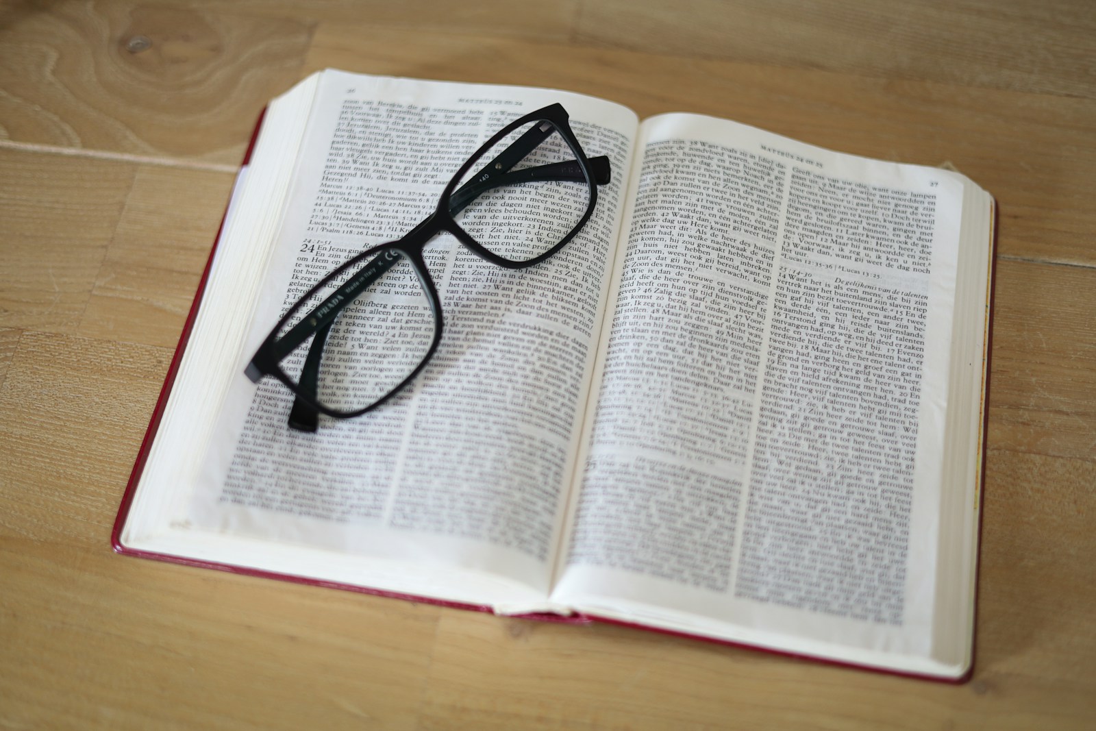 a pair of glasses on a book